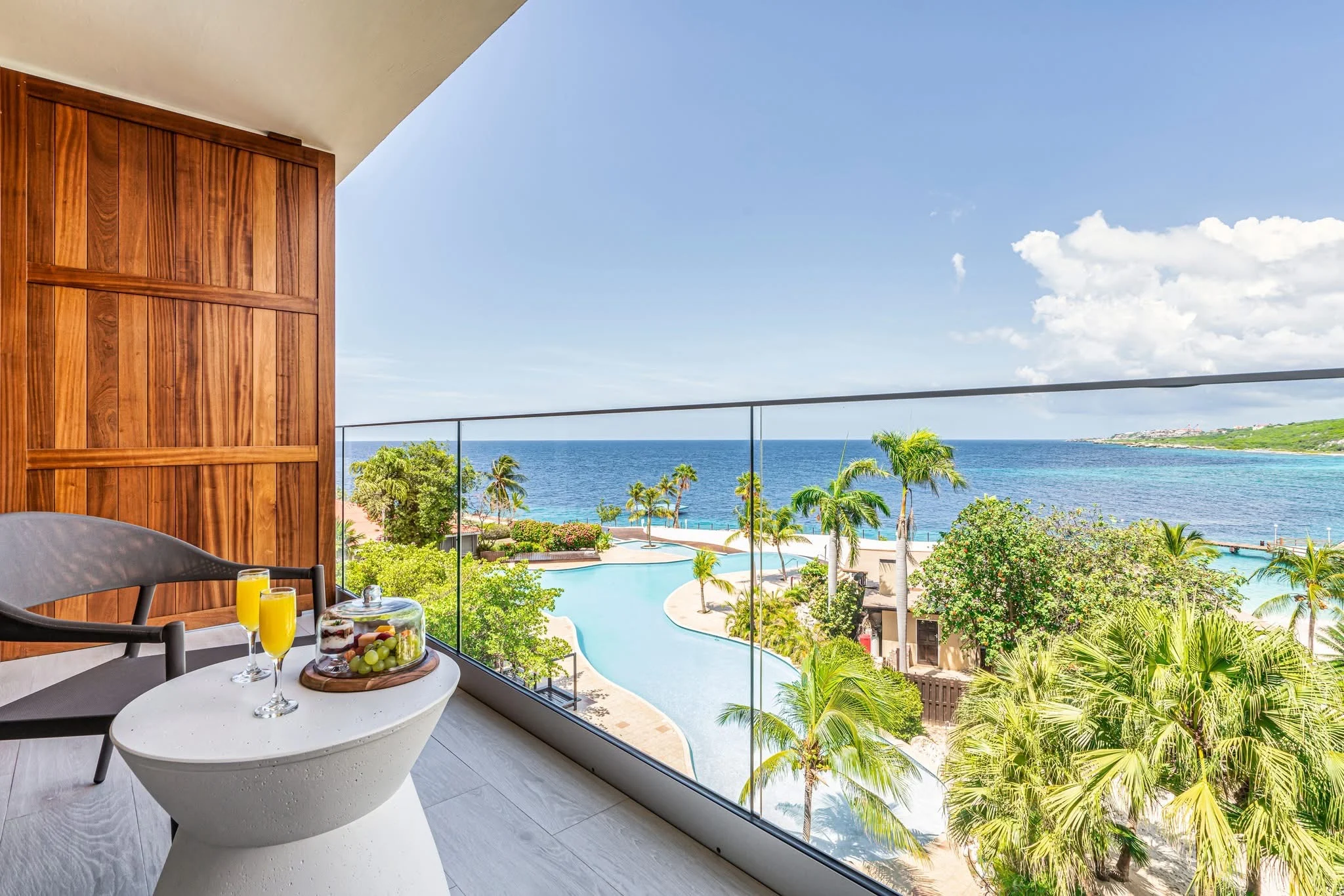 Breakfast on balcony overlooking the beach