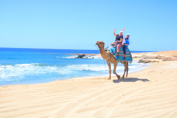 Hunter Landau on a camel