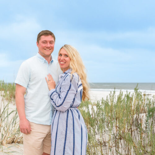 Kathleen and man on grassy beach