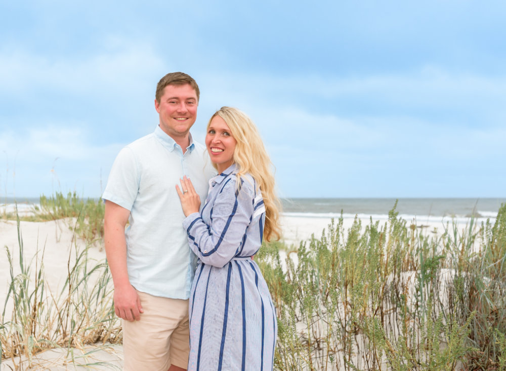 Kathleen and man on grassy beach